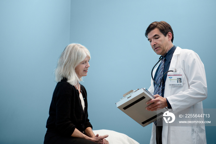 Doctor talking to senior patient