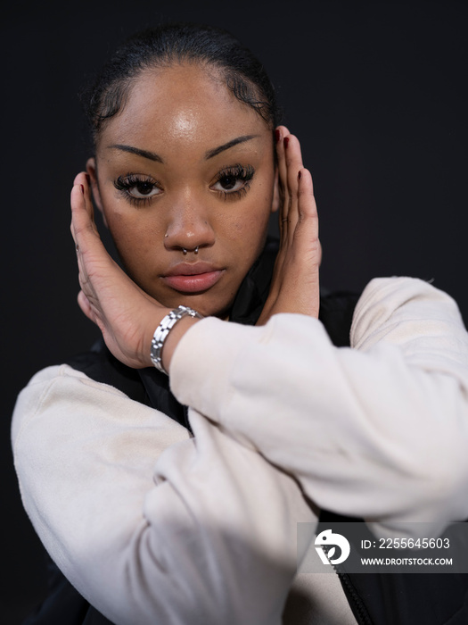 Portrait of teenage girl gesturing