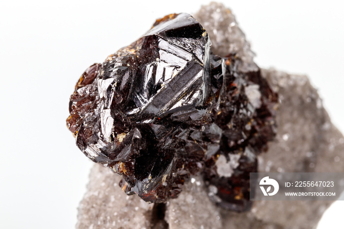 Macro of mineral Sphalerite stone on microcline on white background