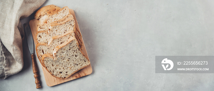 Organic sour dough non-gluten bread on wooden board