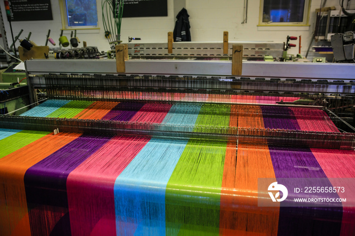 Modern weaving machine producing elaberate patterned textile for the World markets