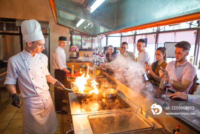 chef cooking seafood in a restaurant.