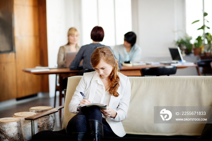 Businesswoman working in home office