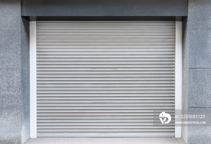 Steel shutter door of warehouse, storage or storefront for background and textured.