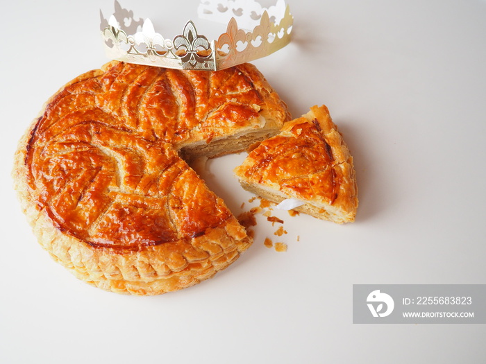 Homemade Epiphany cake or Twelfth Night cake (french galette des rois) made of puff pastry and frang