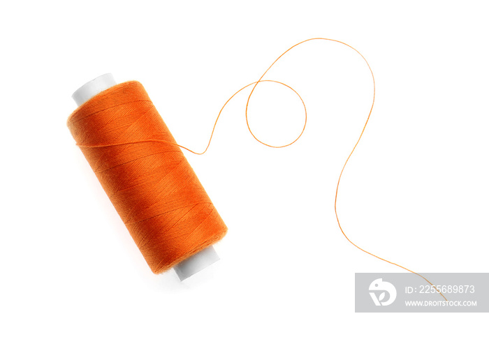 Sewing thread spool on white background