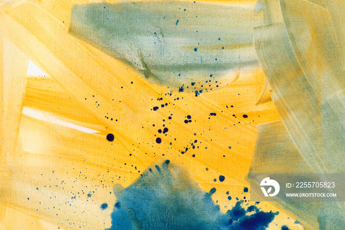 抽象的黄色和浅蓝色水彩背景。颜色在纸上飞溅。丙烯酸疼痛