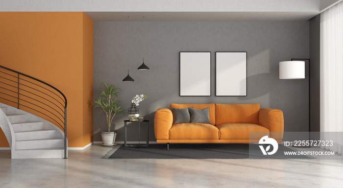 Gray and orange modern living room with staircase