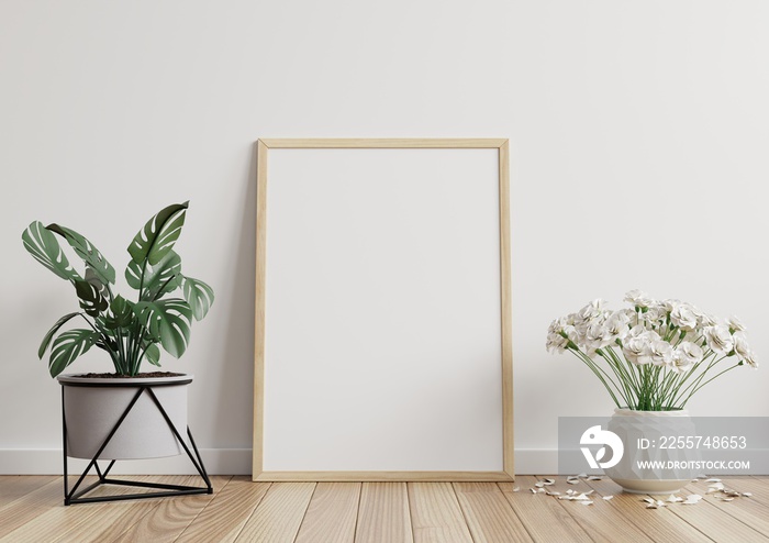 Mock up photo frame in the room, white wall on the wooden floor, beautiful pattern, decorated with p