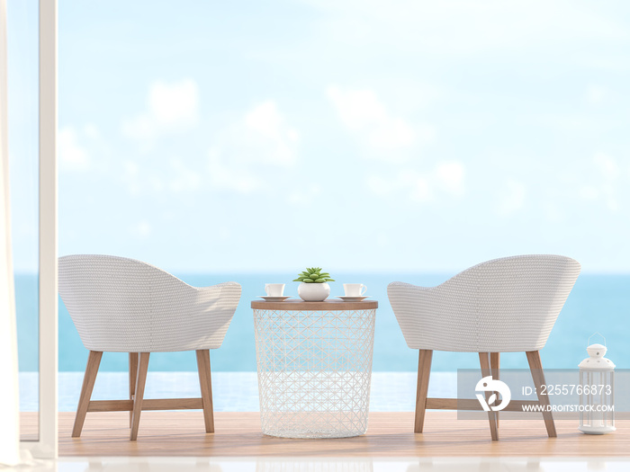 Closeup image of 2 white chairs with wooden legs Located on the pool terrace With a blurred sea back