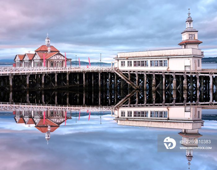 Abandoned old Victorian wooden pier building at Dunoon