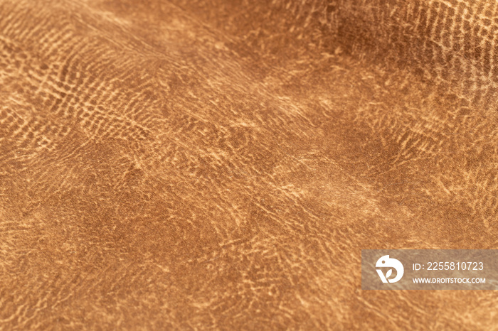 brown faux suede leather for the concept and style idea of fine leather craft, handmade work space.