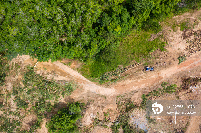 Top down aerial view of deforestation and logging in a tropical rainforest.  Deforestation contributes in a large way to habitat loss and man-made climate change.