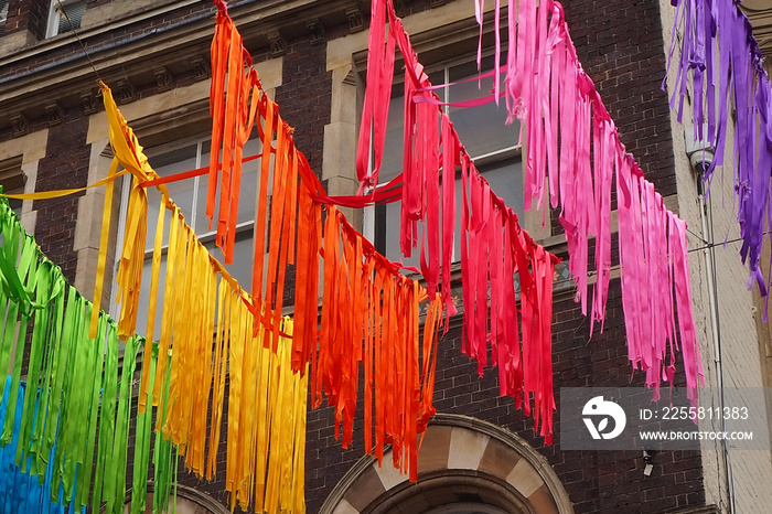 Derby Cathedral in England with joyful art display of ribbons and flags