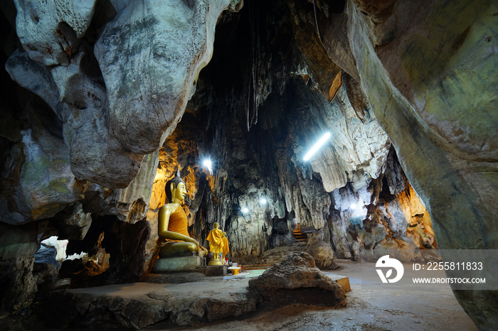 Natural rock cave Light up the path and hallway Wat Tham Khao Pun Kanchanaburi province of Thailand