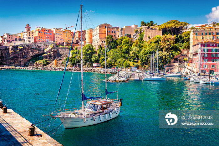 Attractive summer cityscape of Bastia port. Bright morning view of Corsica island, France, Europe. Stunning Mediterranean seascape with yacht and lighthouse. Traveling concept background.