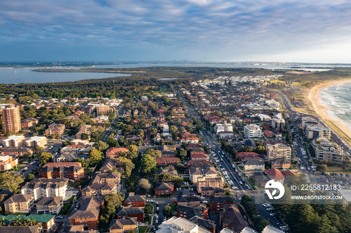 Panoramic aerial drone view of Cronulla in the Sutherland Shire, South Sydney, looking toward North Cronulla Beach during summer in the early morning