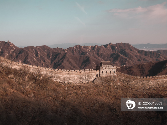 The Great Wall of China on the top of the Chinese mountains during winter - New Seven Wonders of the World