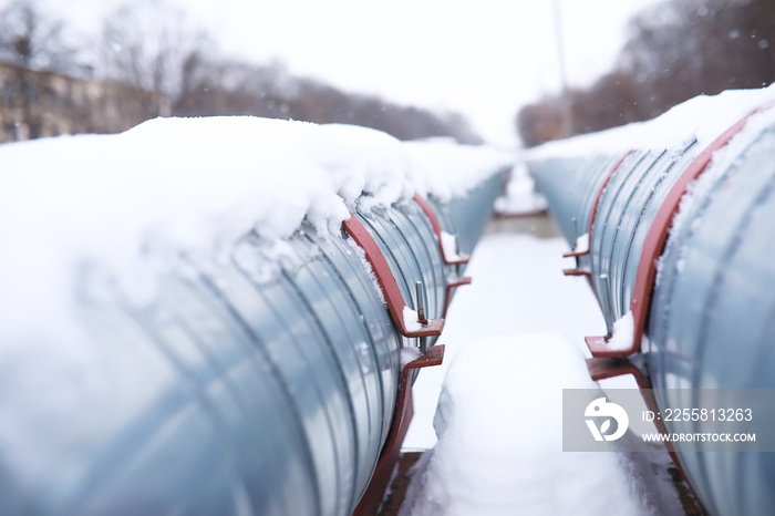 Gas pipe transite snow winter. Winter landscape with the snow-covered gas pipeline and trees in hoarfrost.