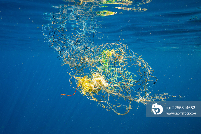 Fishing waste floating in the sea.