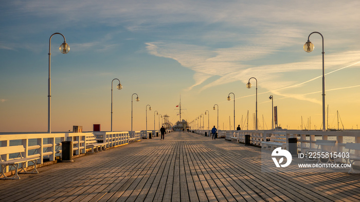 The Sopot Pier in the city of Sopot. The pier is the longest wooden pier in Europe. Beautiful sunrise.