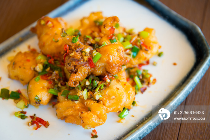 Fried squid with garlic, pepper, chilli and salt delicious Thai food