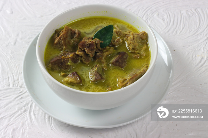 Gulai or gule Kambing. Traditional Javanese mutton curry soup with coconut milk.