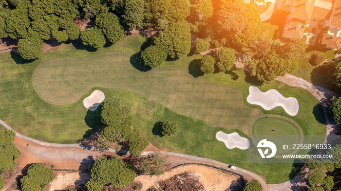 Golf course beautiful Aerial view of golf field landscape with sunrise view in the morning shot. Portugal, Algarve