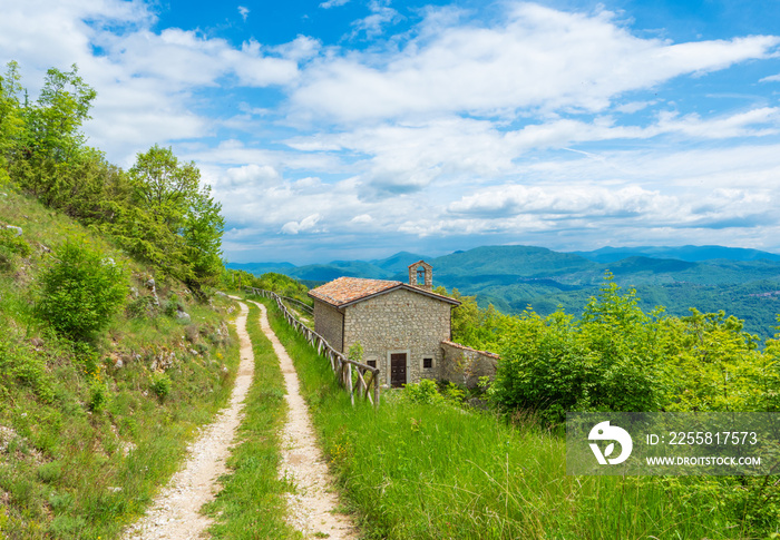 Cicolano (Italy) - The green mountain area of Salto Lake, Lazio region province of Rieti, with the ruins of medieval castle named Poggio Poponesco