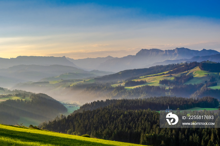 Panoramic view over the alps and hills of the emmental valley