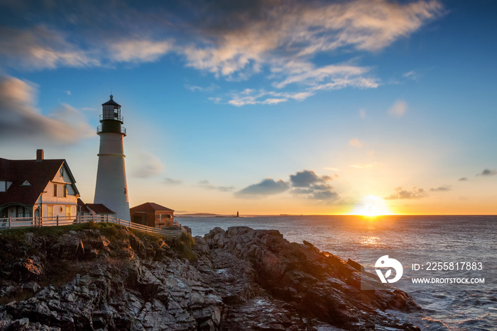 Portland Head Lighthouse at Fort Williams, Maine at sunrise over the Atlantic