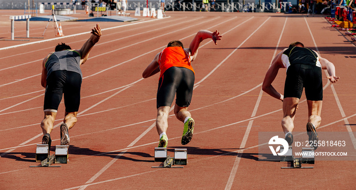 start runners athletes 100 meters race track and field competition