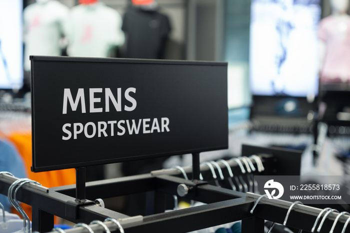 Close up of MENS SPORTSWEAR Sign in the sports clothes superstore
