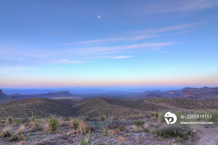 Moon over a desert landscape in Texas USA