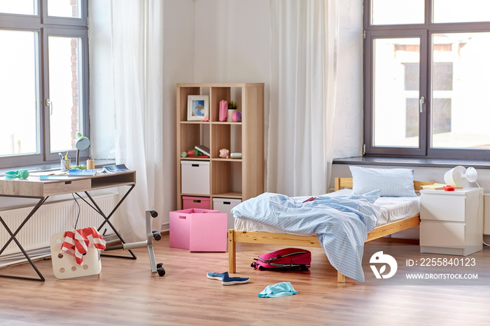 mess, disorder and interior concept - view of messy home kids room with scattered stuff