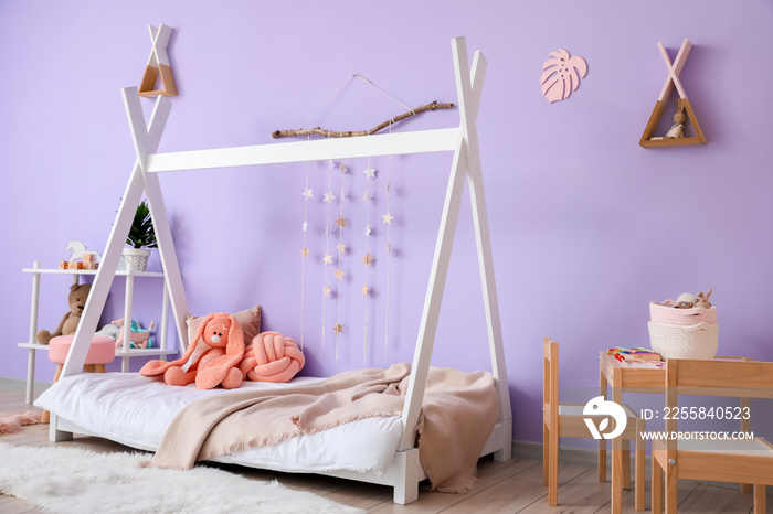 Interior of modern childrens room with comfortable bed