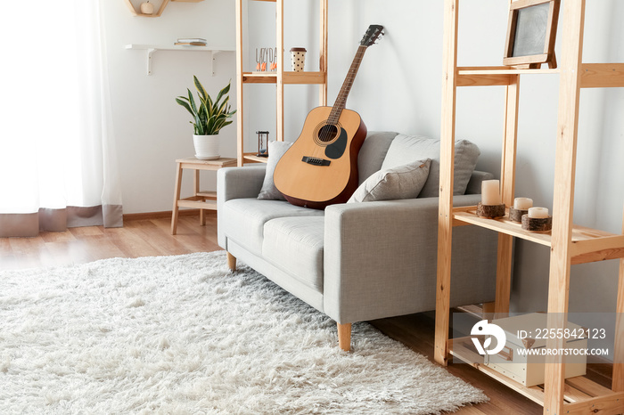 Stylish interior of room with sofa