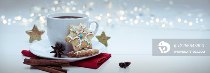 Christmas Cookie with garland and coffee cup.