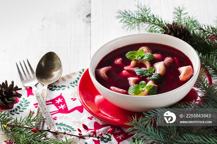 Traditional homemade red borscht dumplings Christmas table