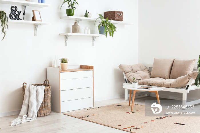 Modern living room with chest of drawers and sofa