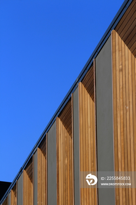 New modern town house development taken from an extreme angle. The windows of the townhouses are fra