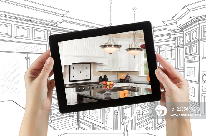 Female Hands Holding Computer Tablet with Kitchen on Screen & Drawing Behind.