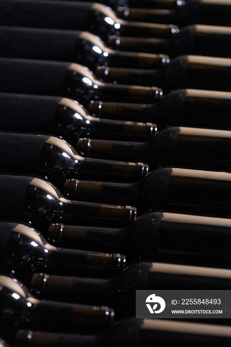 Bottles Arranged In Wine Cellar