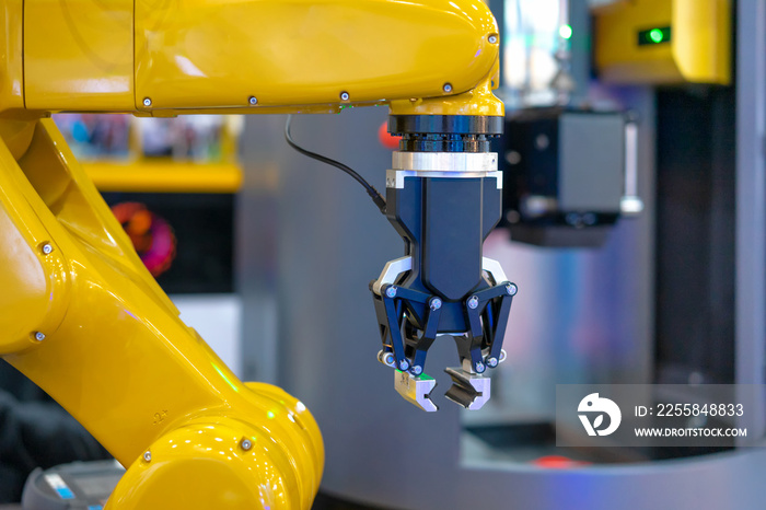 Factory 4.0 concept : View of Gripper on industrial robot in automation machine.