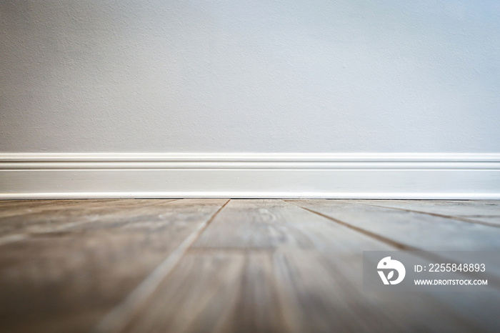 Wood look porcelain tile in planks on a kitchen floor in a recently renovated house