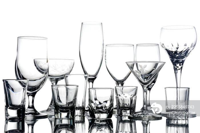Collage of empty glasses on white background.
