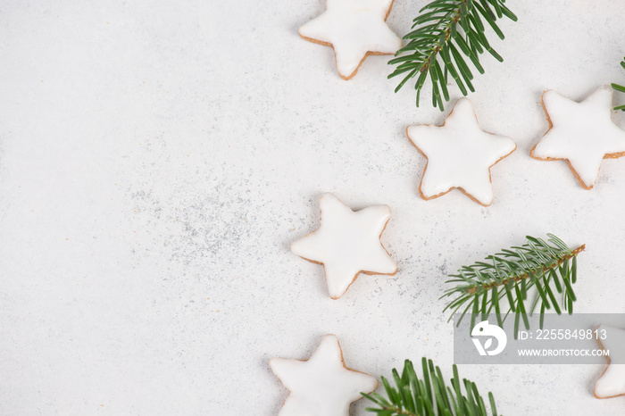 Cinnamon stars, traditional german christmas sweets, gingerbread coated with white sugar, winter sea