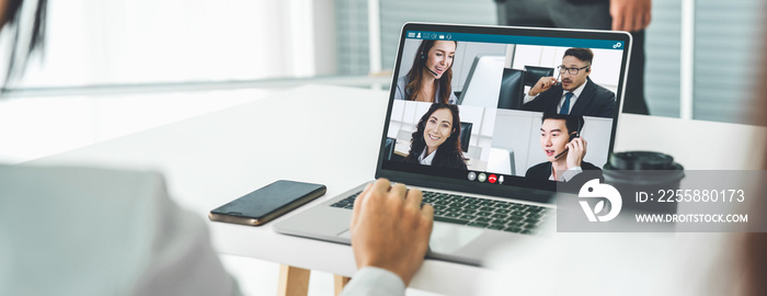 Business people in video call meeting proficiently discuss business plan in office and virual workplace . Telework conference call using smart video technology to communicate colleague .