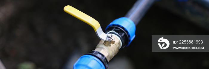 Closeup of pvc pipes with tap or faucet