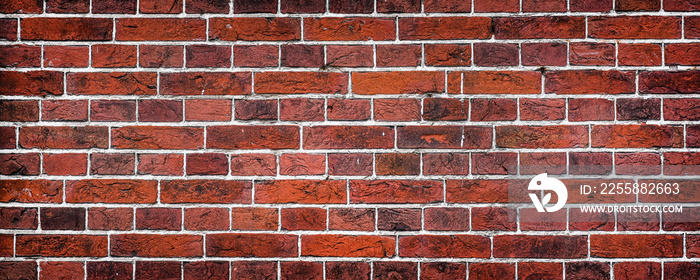 Panorama of old rustic brick wall. Red masonry surface background and texture.